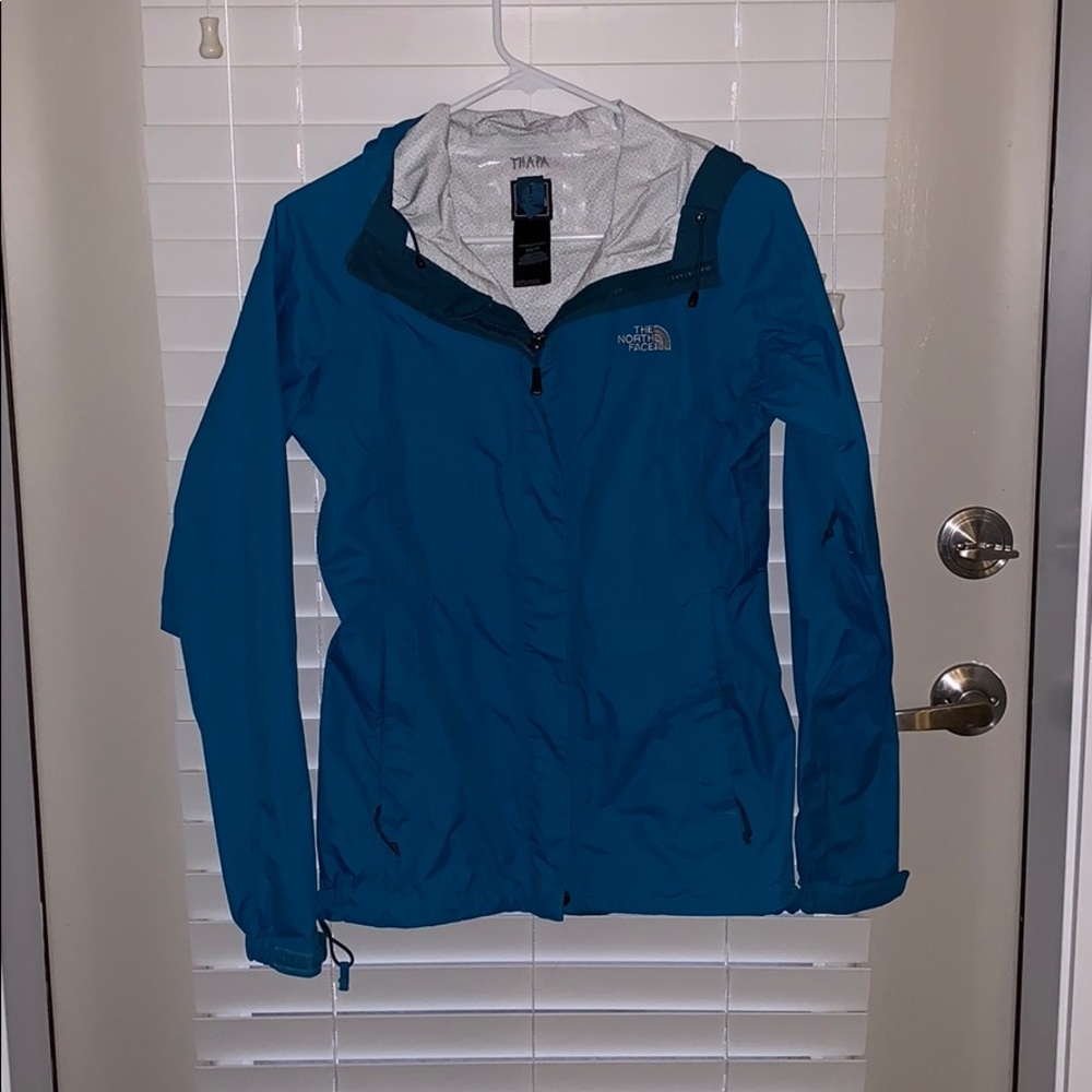 Blue north face rain coat